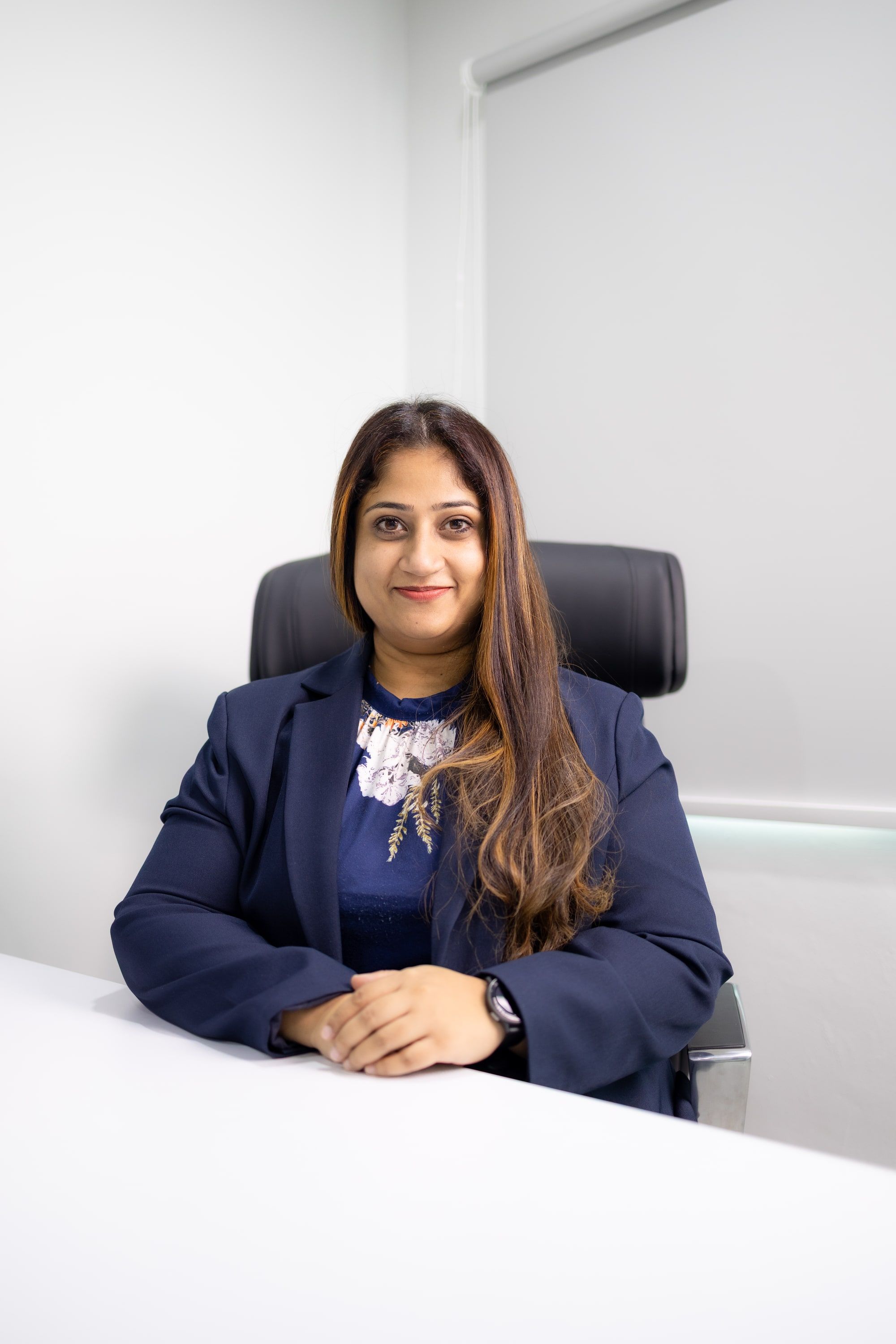 Dr Bheena Vyjhallaja at her desk in her consulting room at KPJ Damansara Specialist Hospital
